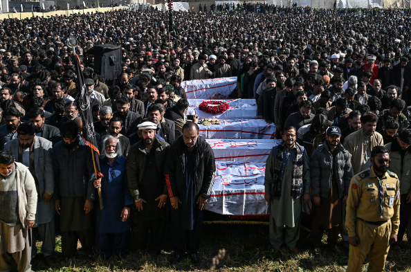 Look: Thousands gather as Pakistan buries victims of mosque suicide attack