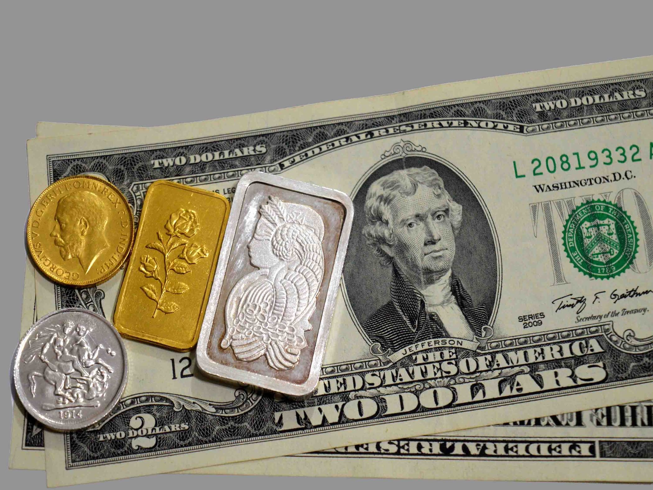 Gold, silver prices on firmer dollar