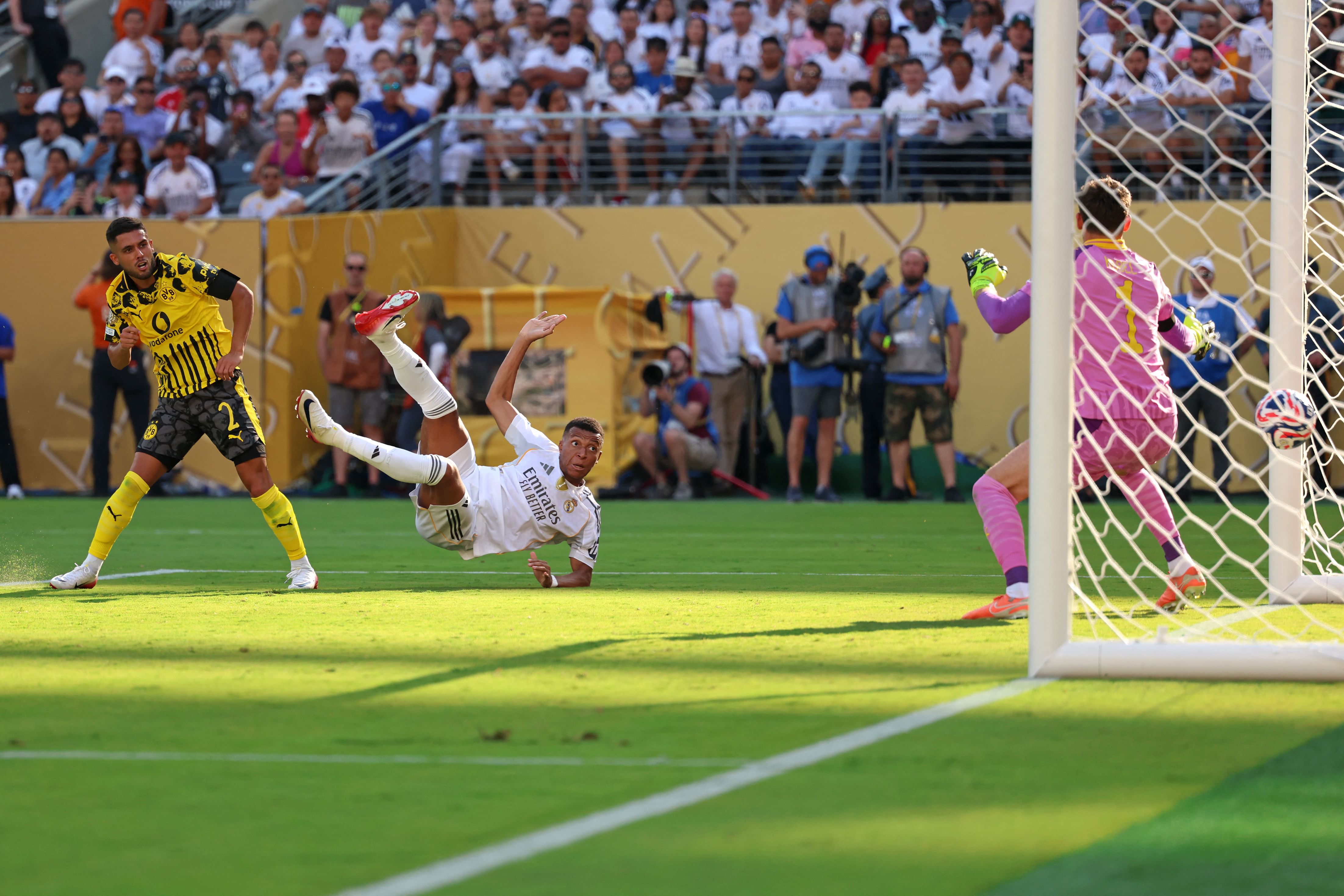 Real Madrid survive Dortmund scare to reach Club World Cup semis