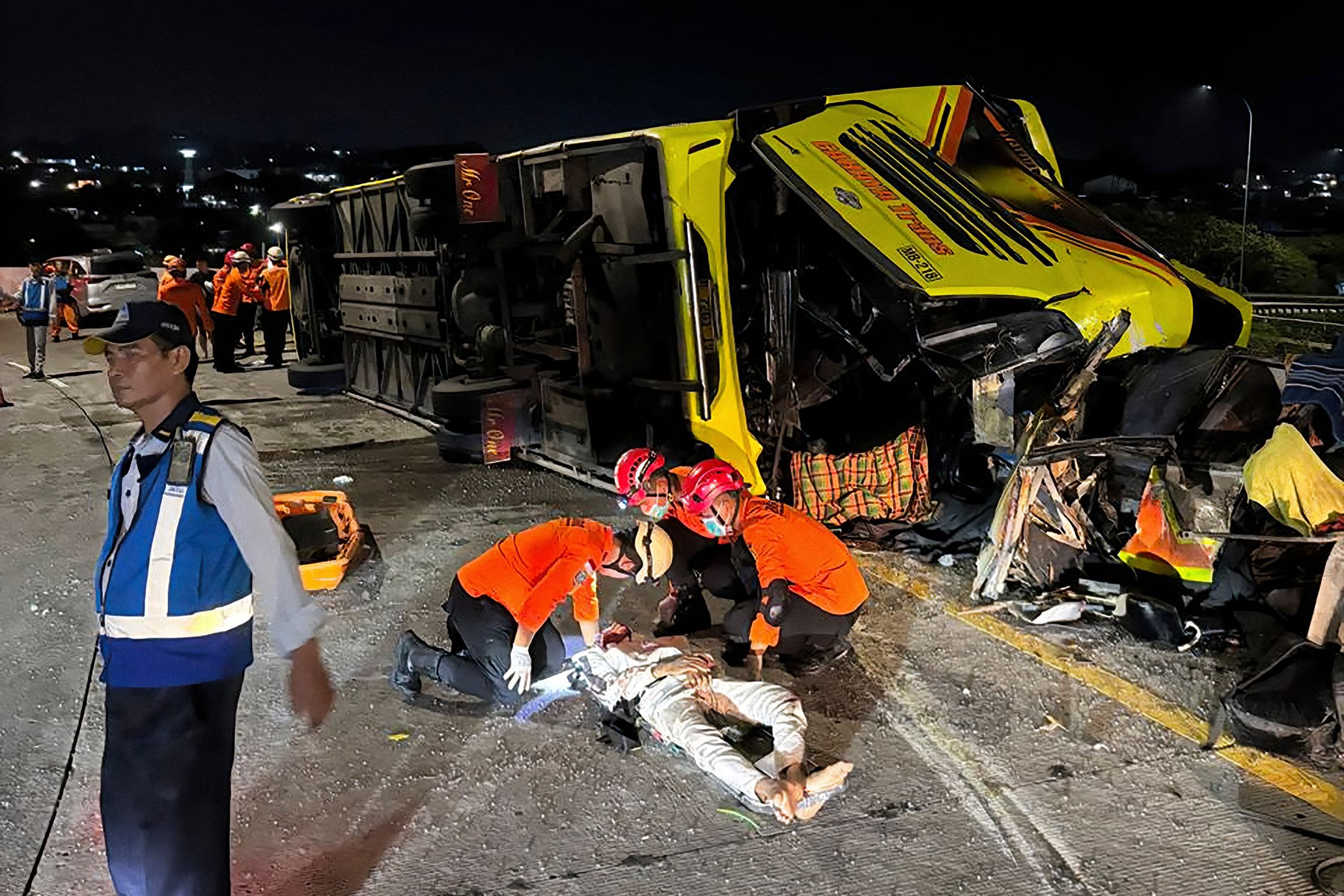 Passenger bus crash in Indonesia kills at least 16 people