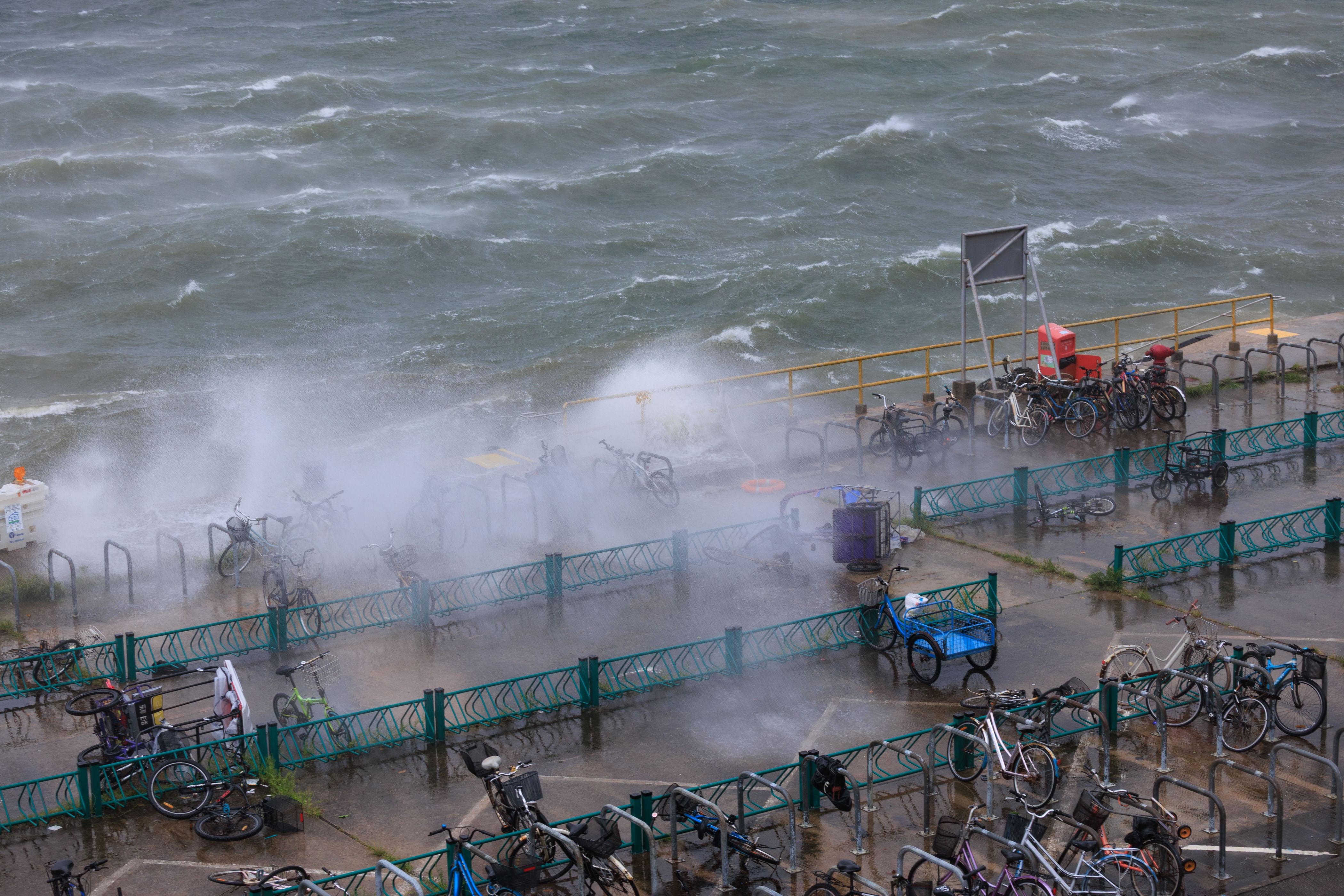 Hong Kong cancels tropical cyclone alarms as typhoon Wipha leaves