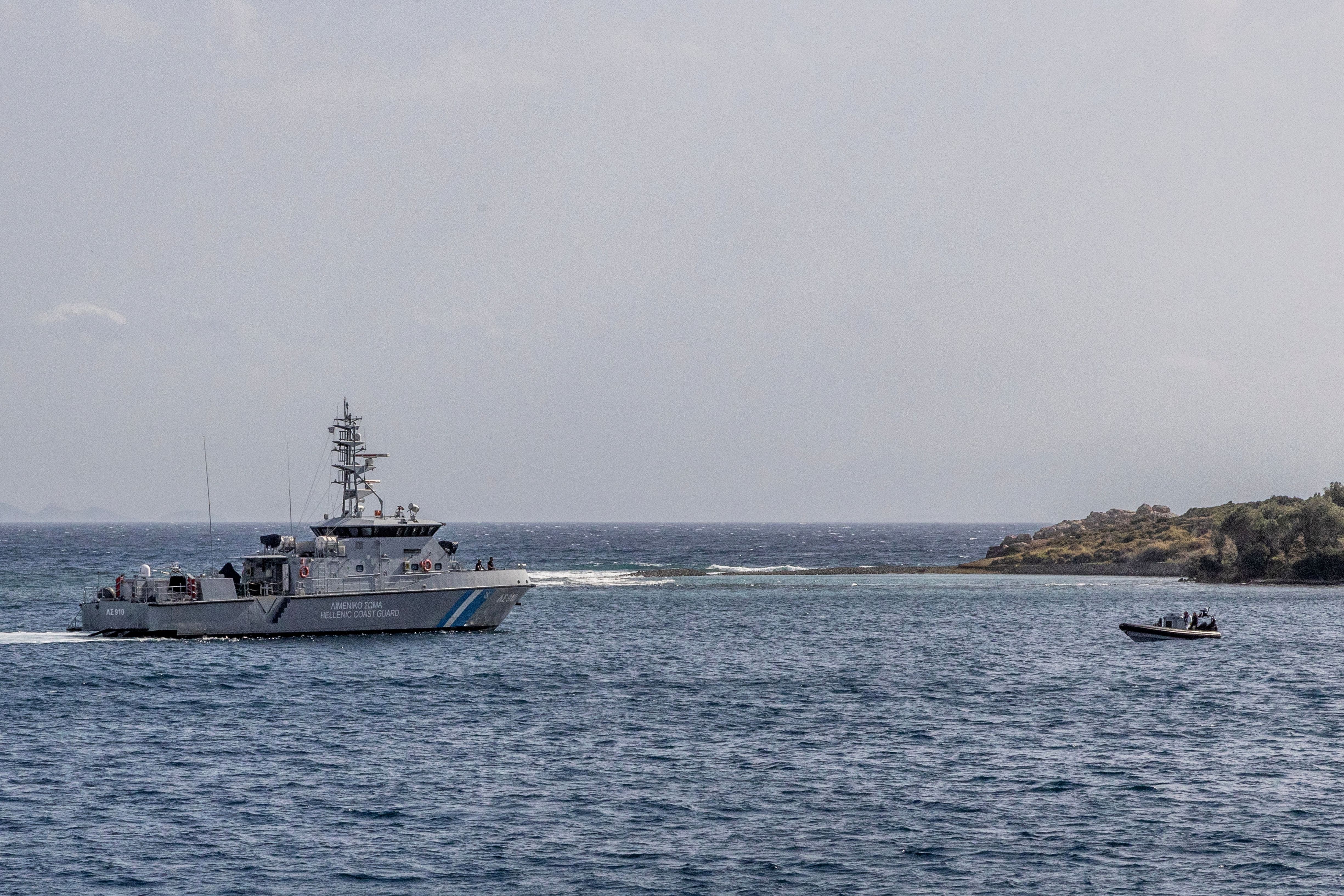 52 migrants rescued, child missing off Greek coast