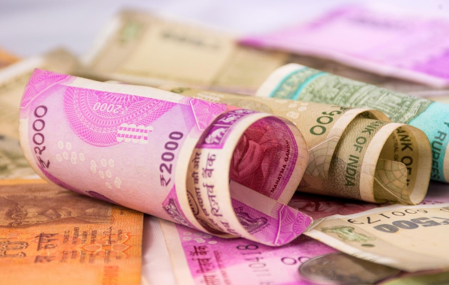 Indian rupee back to losing ways on likely outflows, corporate hedging