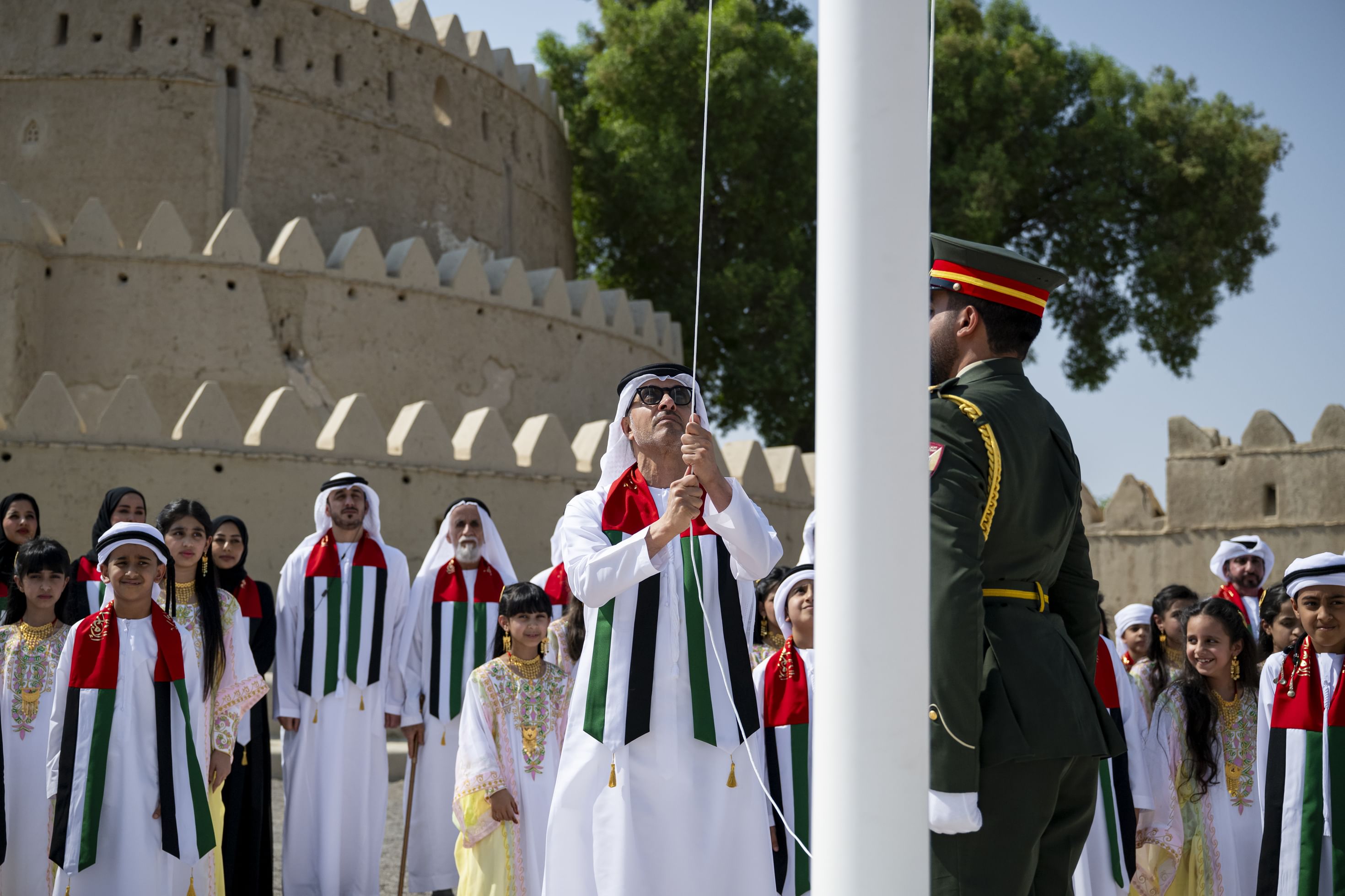 Hazza bin Zayed raises UAE flag at Al Jahili Fort to mark Flag Day