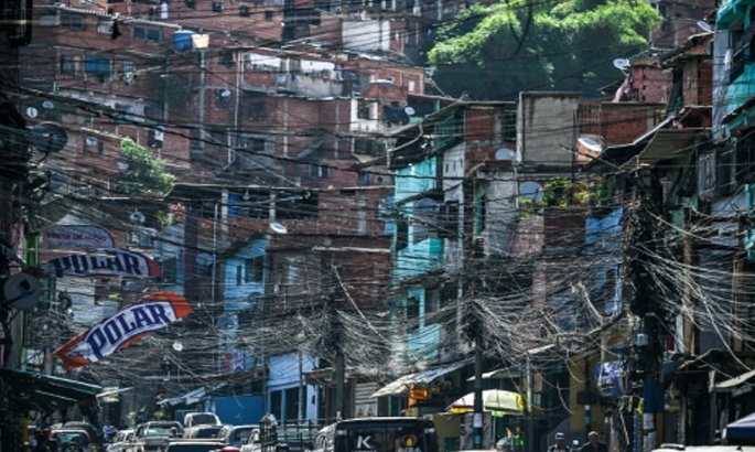 Venezuela cuts public-sector working hours to conserve electricity