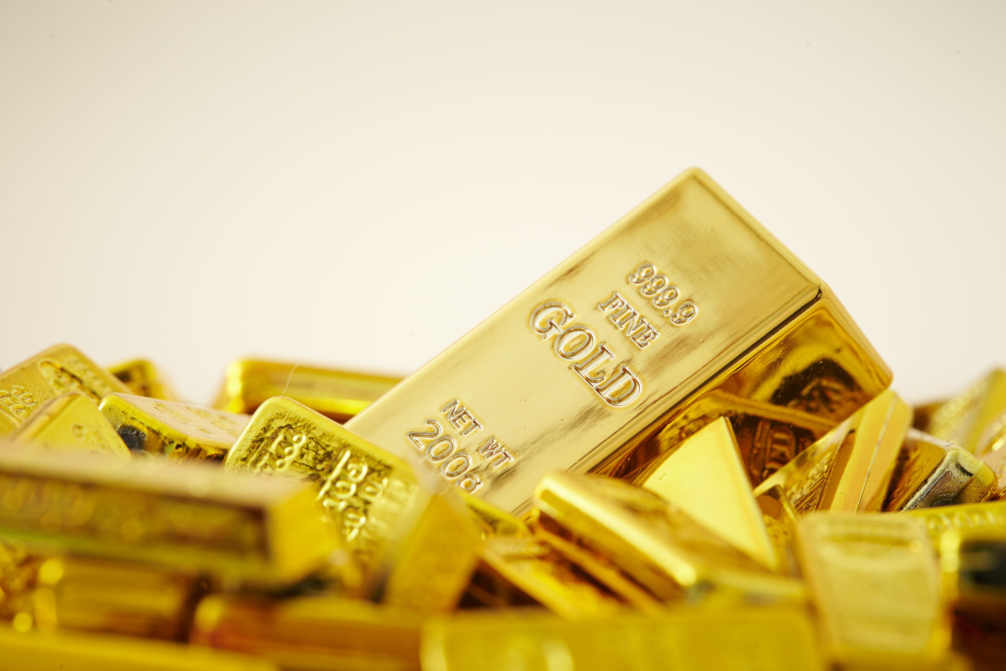 Gold hits near two-week low